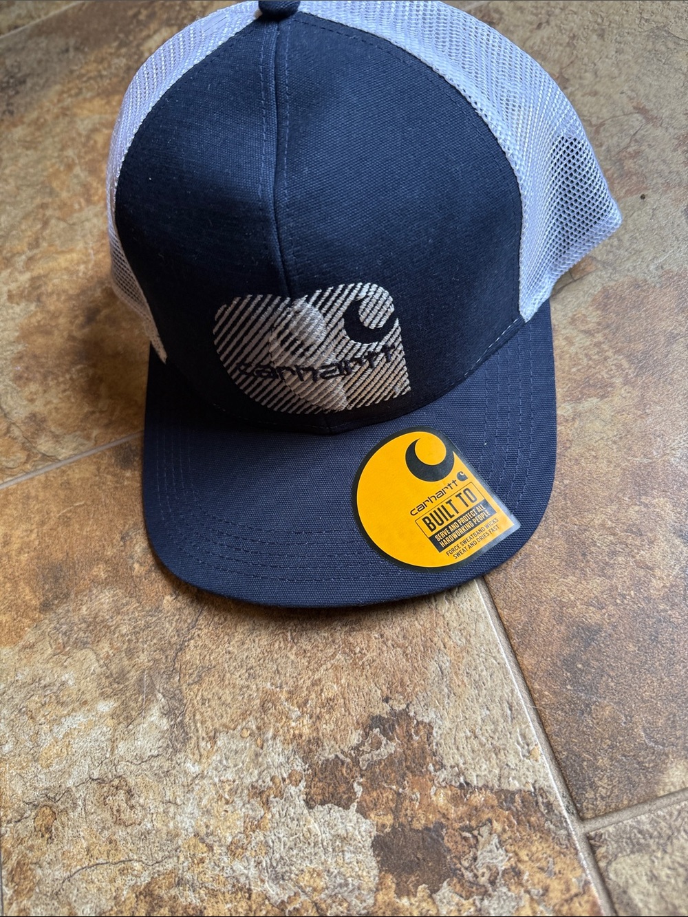 Carhartt navy Front White Mesh Logo Trucker Cap..o/s.,tags on